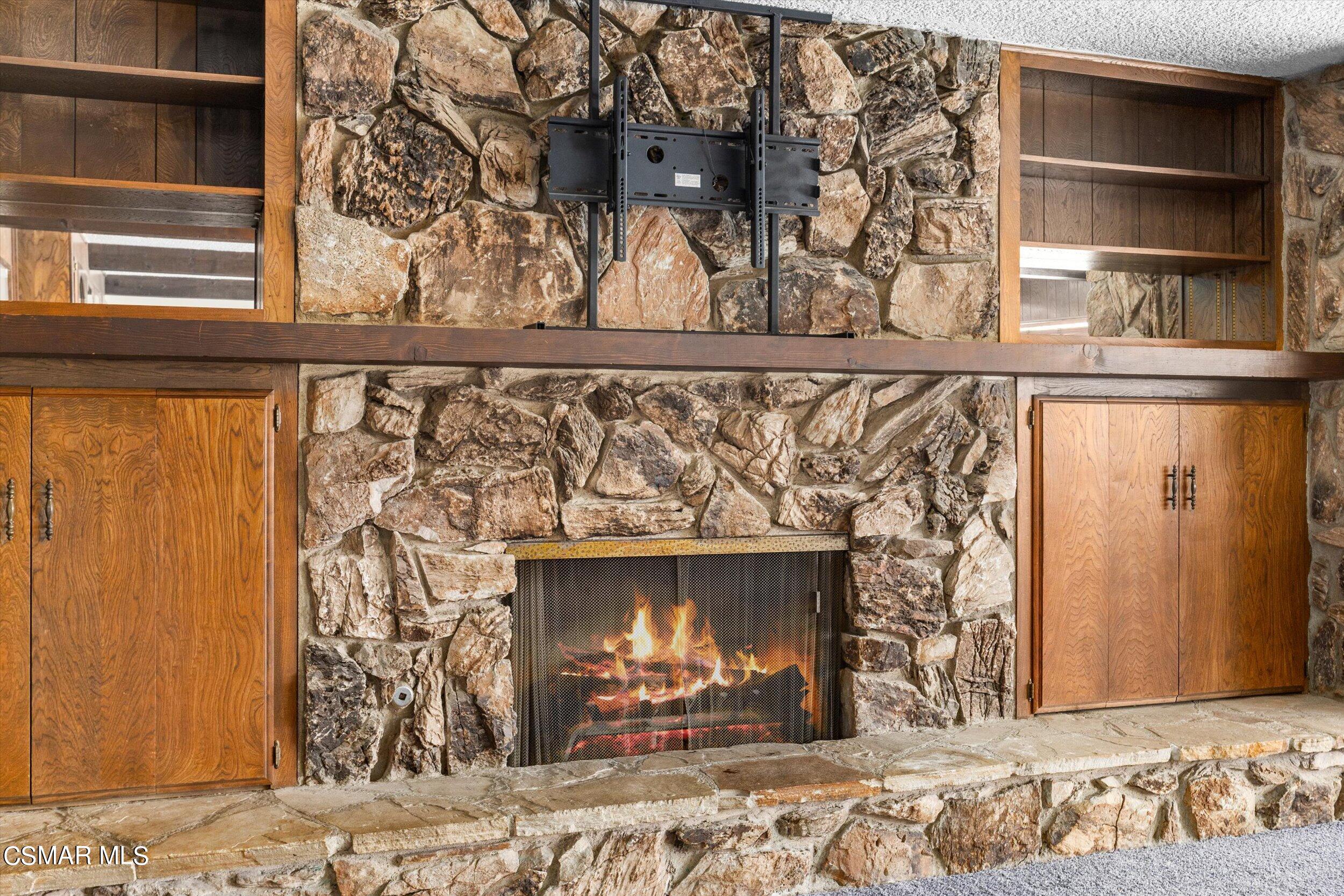 3512 Crest Drive Bakersfield, CA 93306 - Photo 14 of 40 a living room with a fireplace