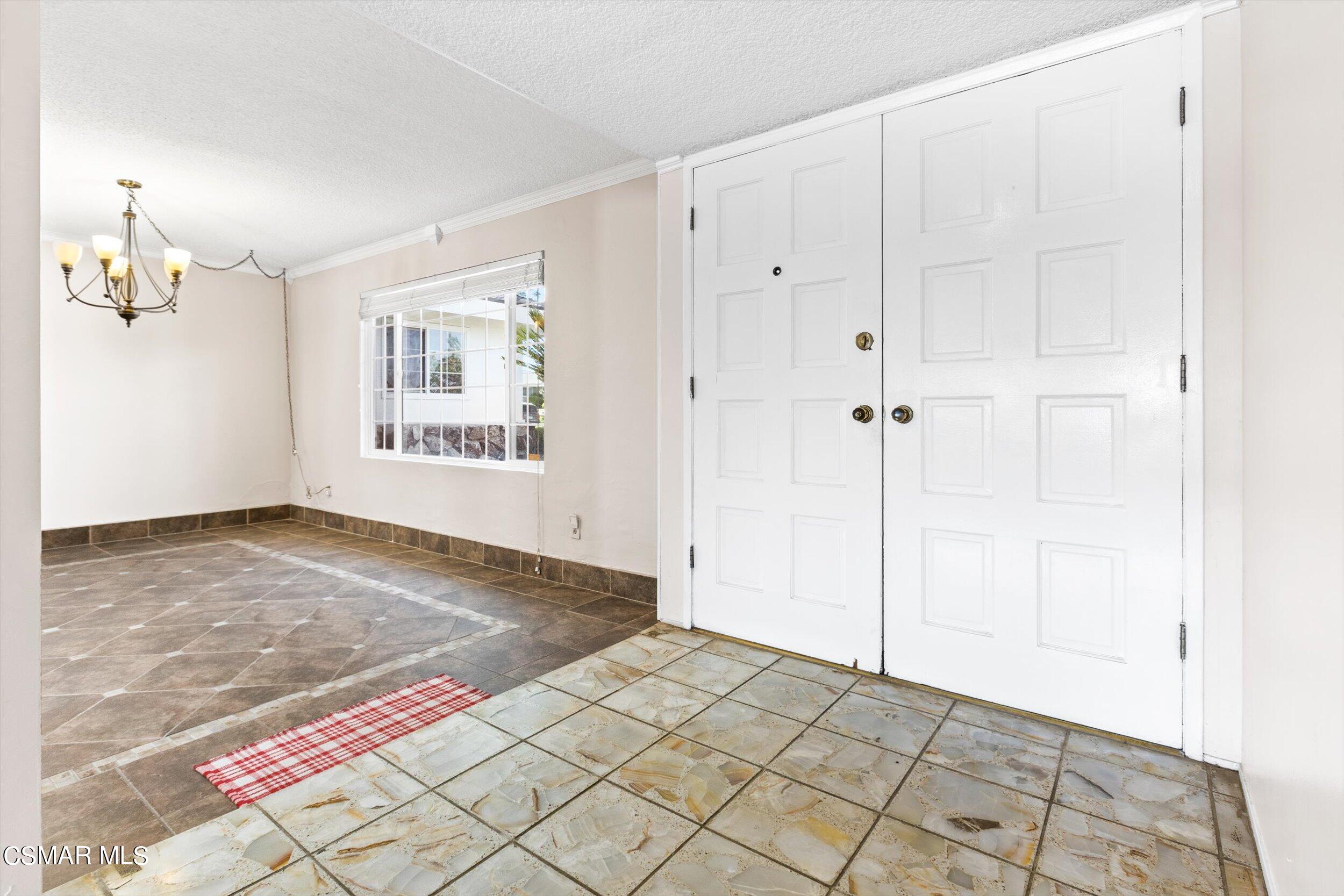 3512 Crest Drive Bakersfield, CA 93306 - Photo 18 of 40 a view of a bedroom with wooden floor and windows