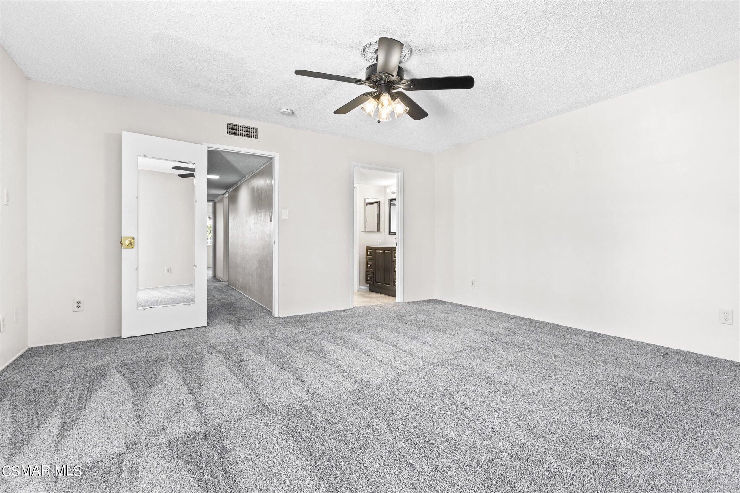 3512 Crest Drive Bakersfield, CA 93306 - Photo 27 of 40 a view of a livingroom with a ceiling fan and window