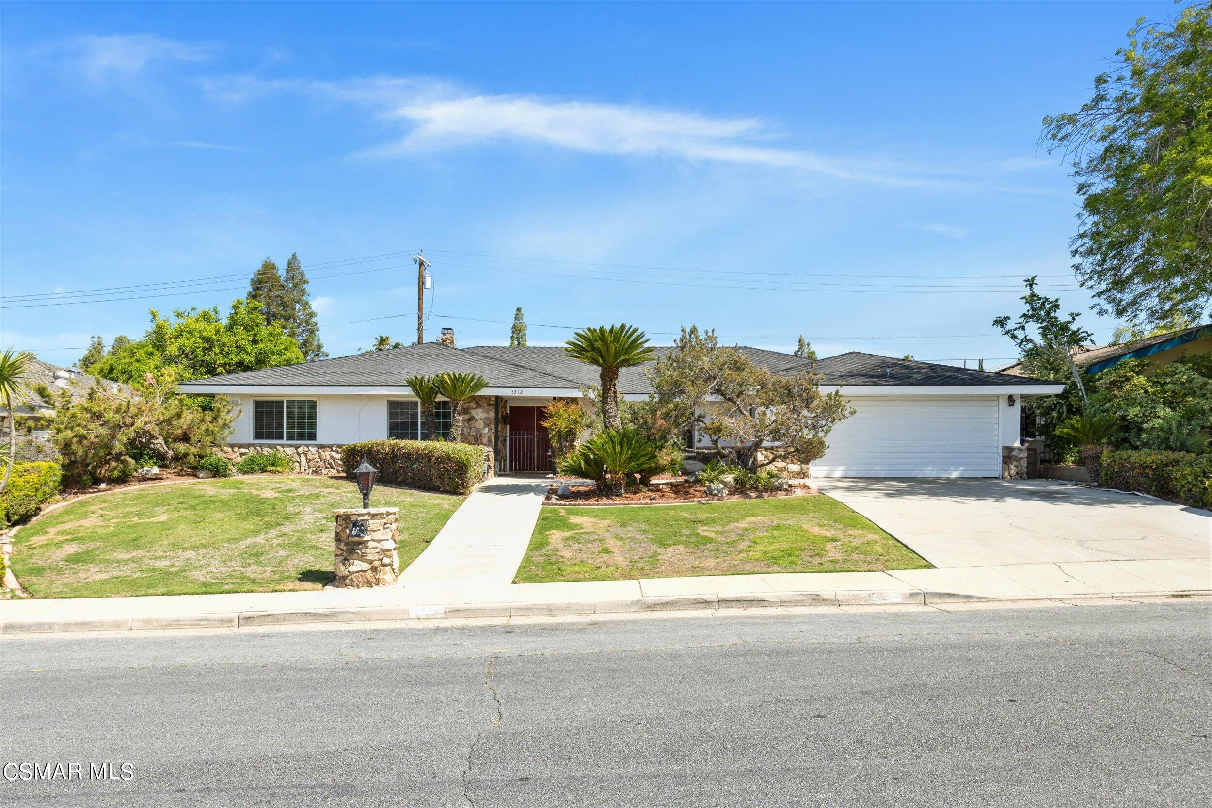 3512 Crest Drive Bakersfield, CA 93306 - Photo 6 of 40 a front view of house with yard