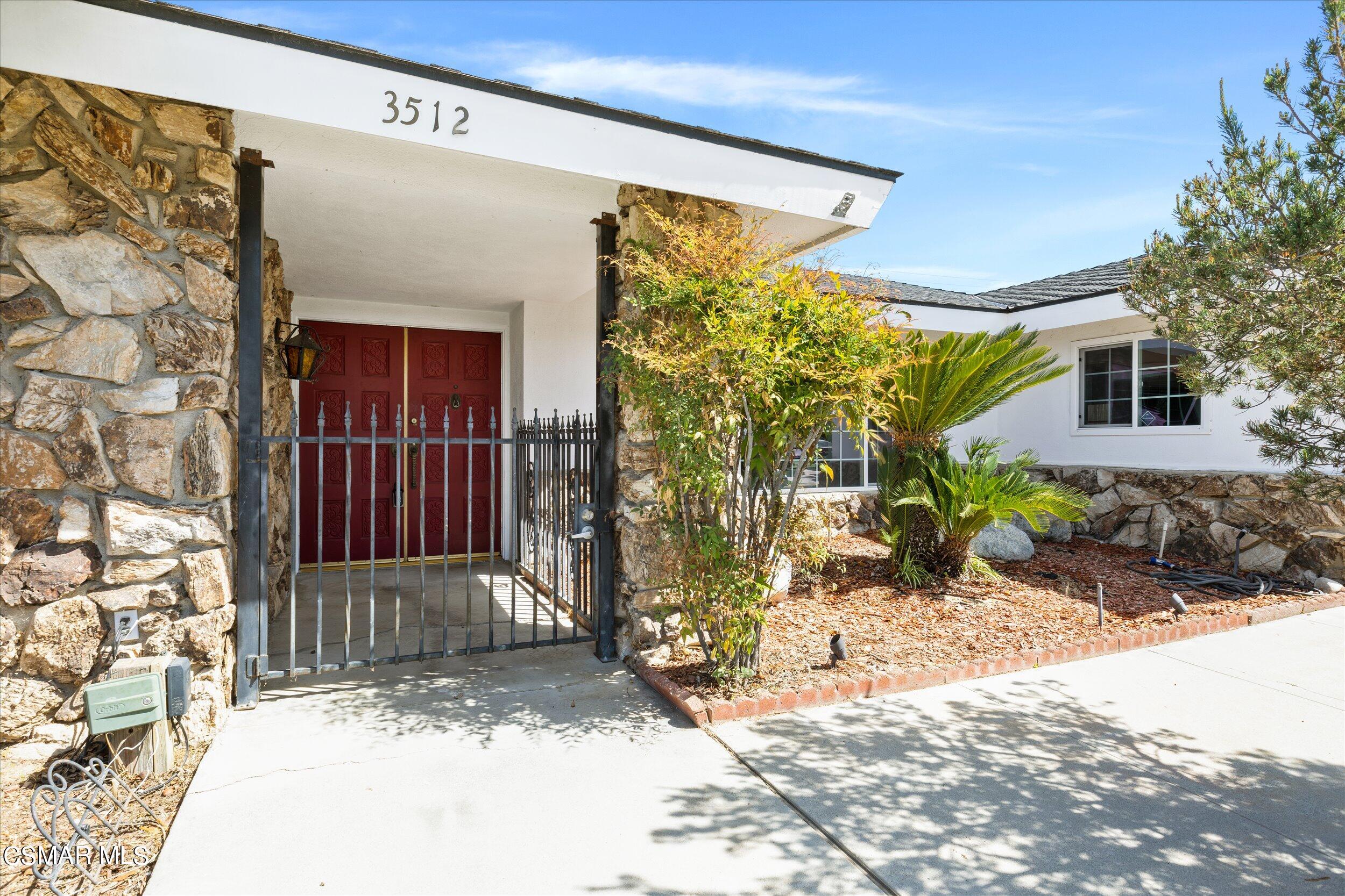 3512 Crest Drive Bakersfield, CA 93306 - Photo 8 of 40 a view of a house with a door and porch