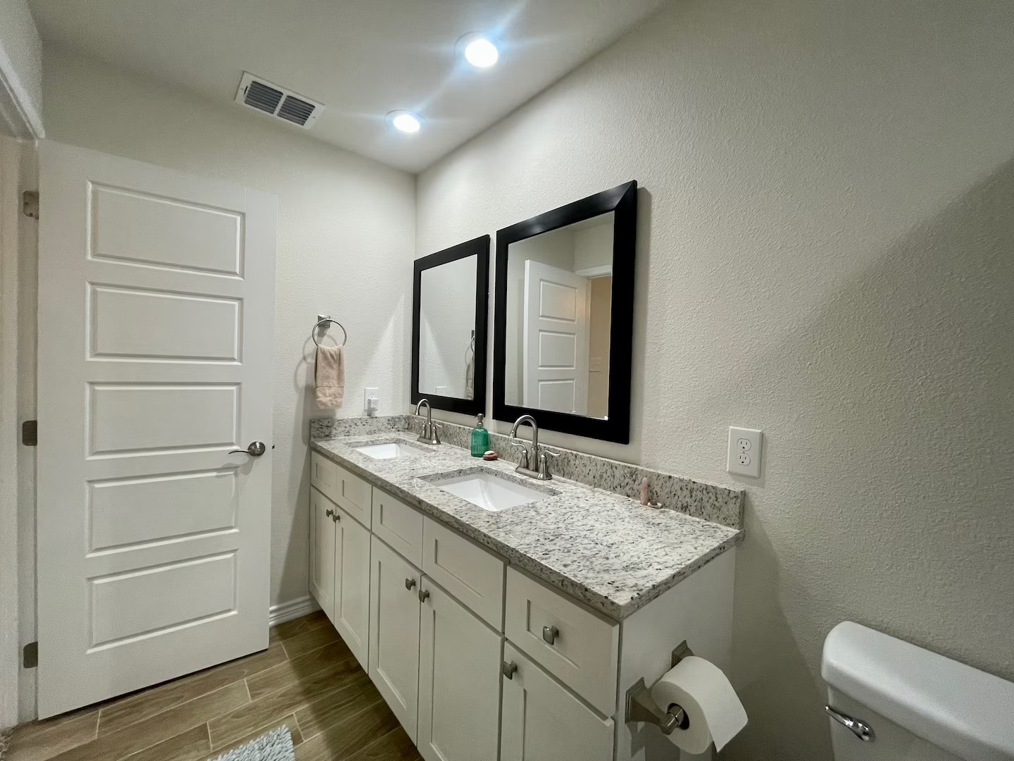 2540 Contour Drive Spring Branch, TX 78070 - Photo 12 of 12 a bathroom with a granite countertop sink and a mirror