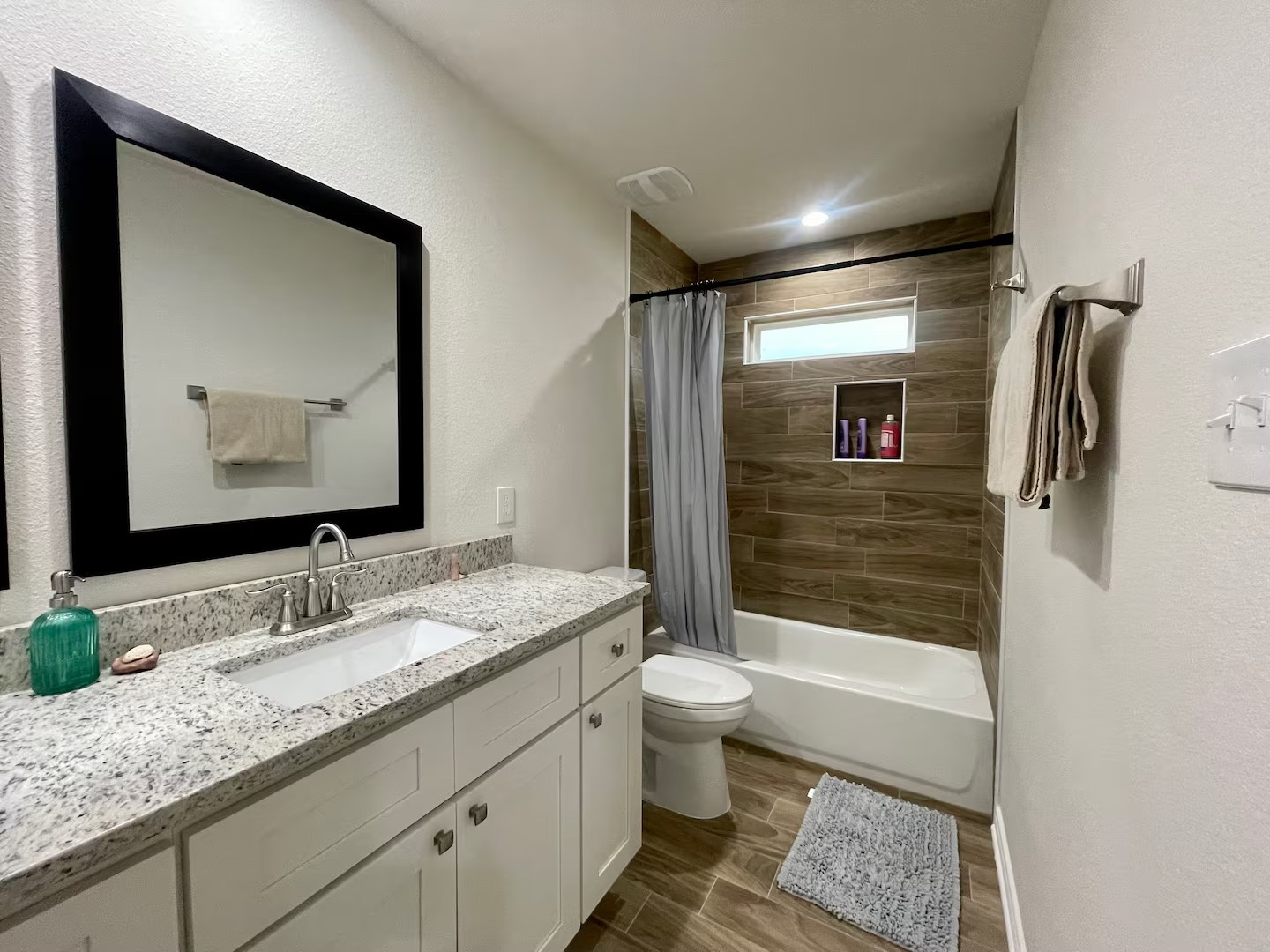 2540 Contour Drive Spring Branch, TX 78070 - Photo 5 of 12 a bathroom with a granite countertop sink toilet and shower