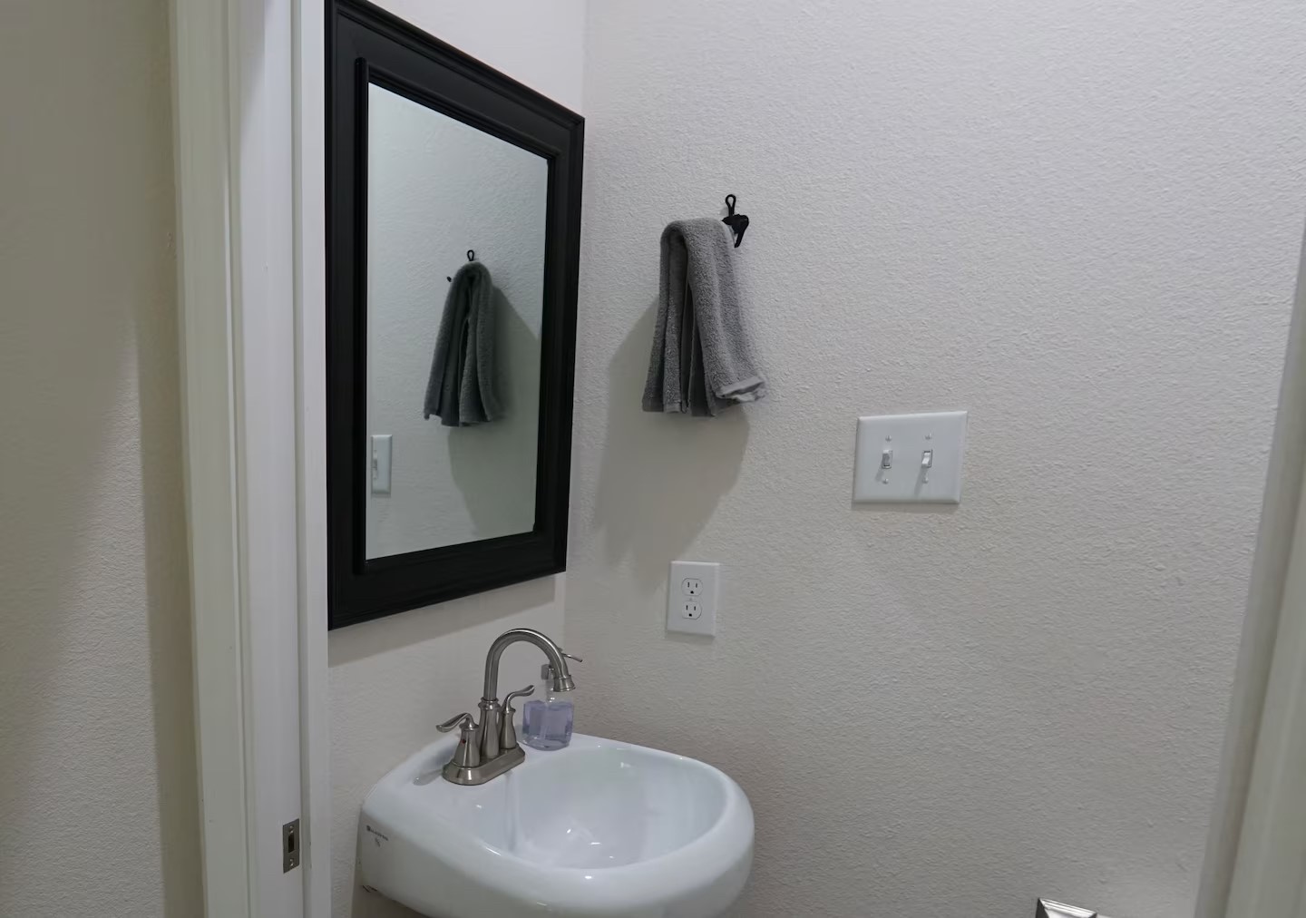 2540 Contour Drive Spring Branch, TX 78070 - Photo 7 of 12 a bathroom with a sink and mirror