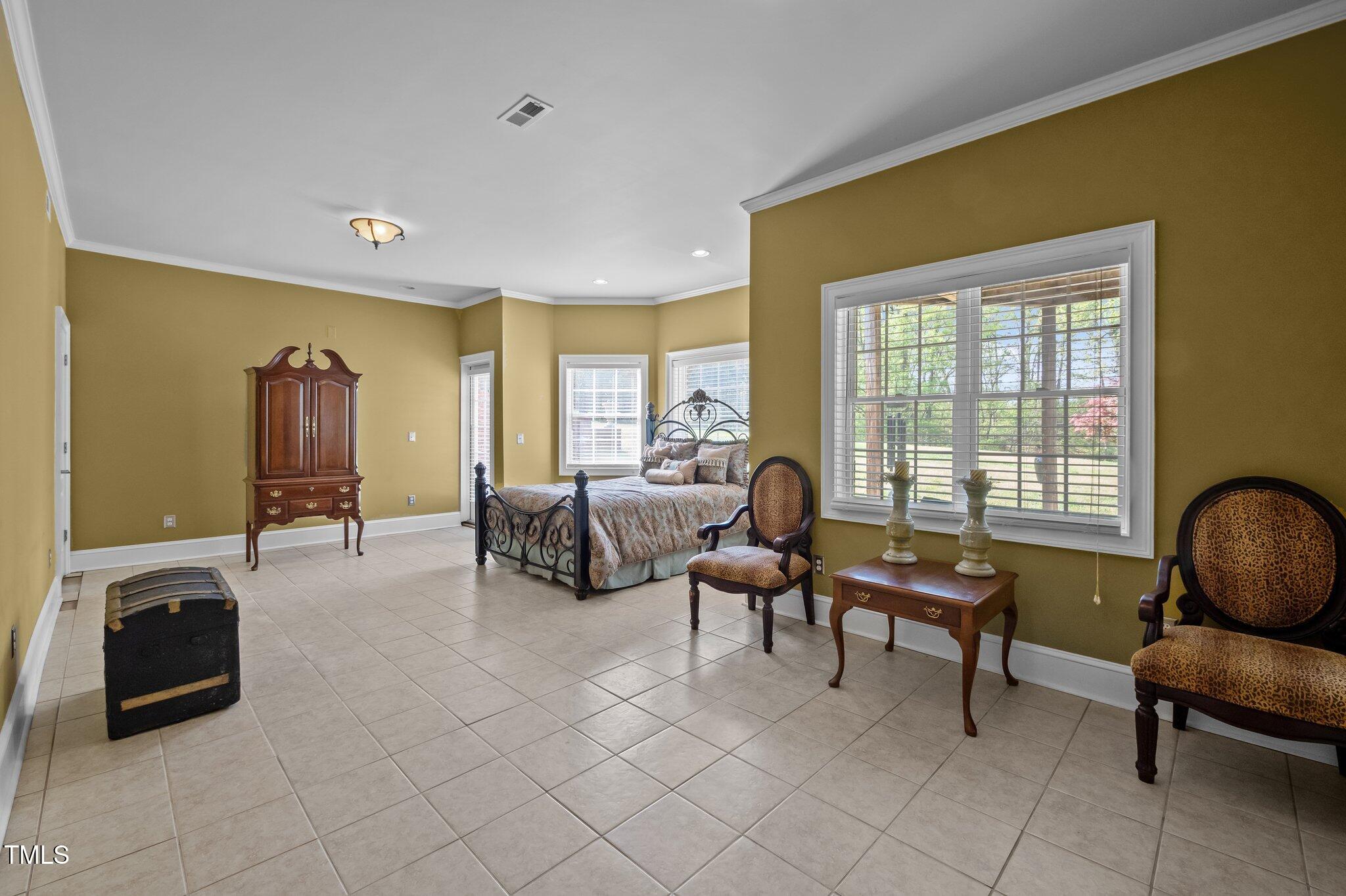 1174 Robertson Road Roxboro, NC 27574 - Photo 41 of 58 a living room with furniture and a window