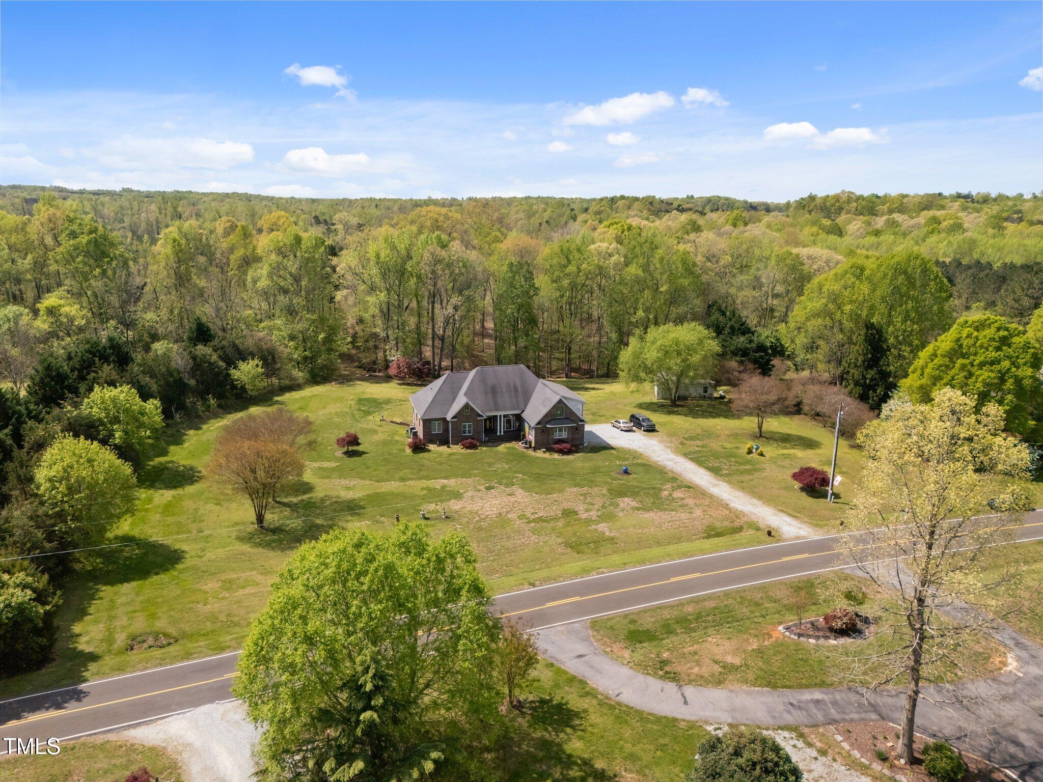 1174 Robertson Road Roxboro, NC 27574 - Photo 4 of 58 a view of a lake from a mountain