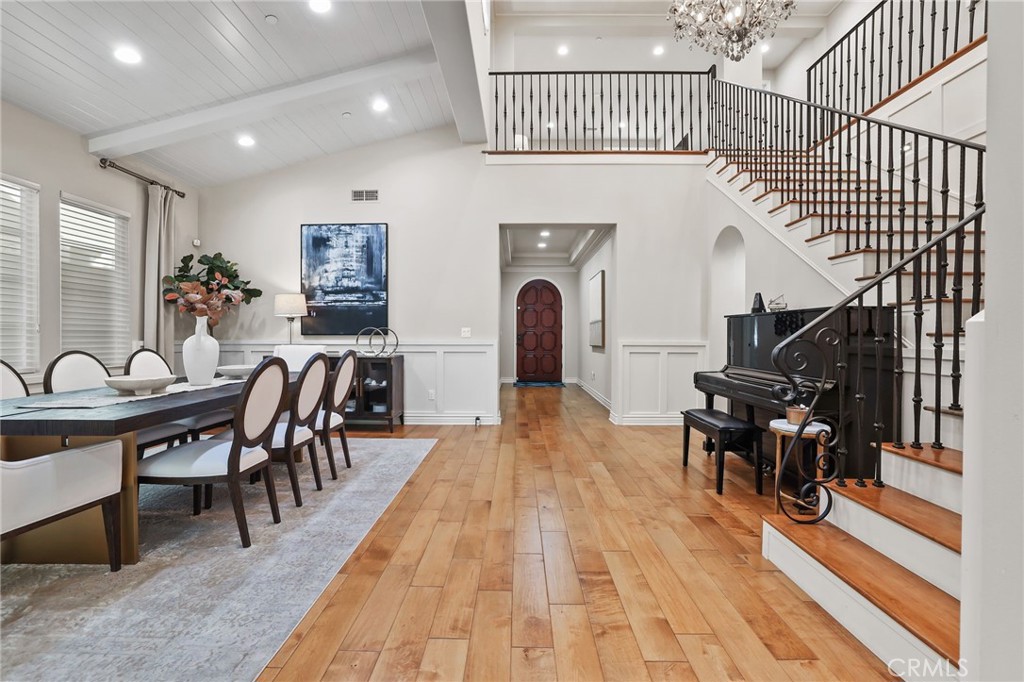 10 Shadybend Irvine, CA 92602 - Photo 21 of 70 a view of a dining room with furniture chandelier and wooden floor