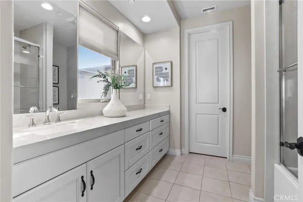 a kitchen with cabinets and appliances