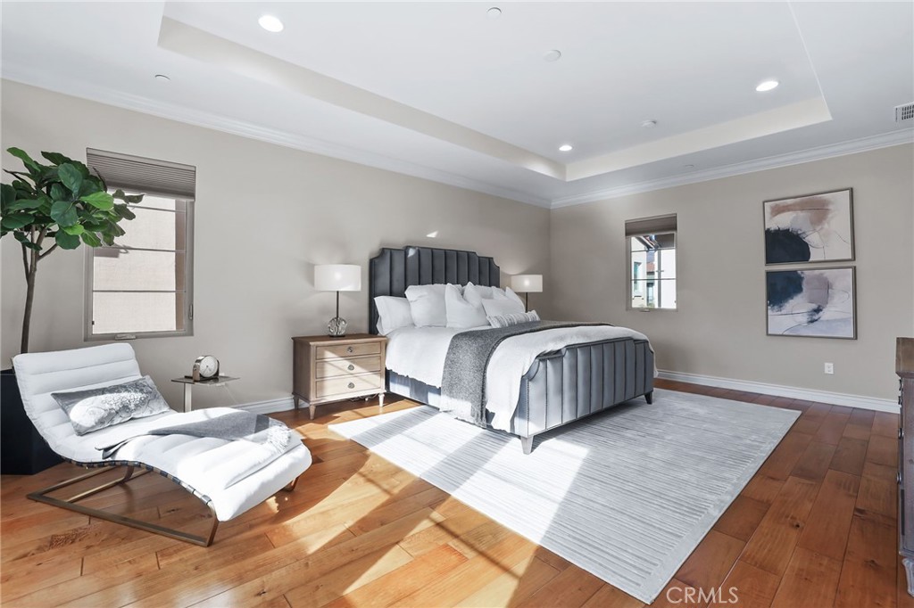 10 Shadybend Irvine, CA 92602 - Photo 41 of 70 a bedroom with a bed lamp and a potted plant