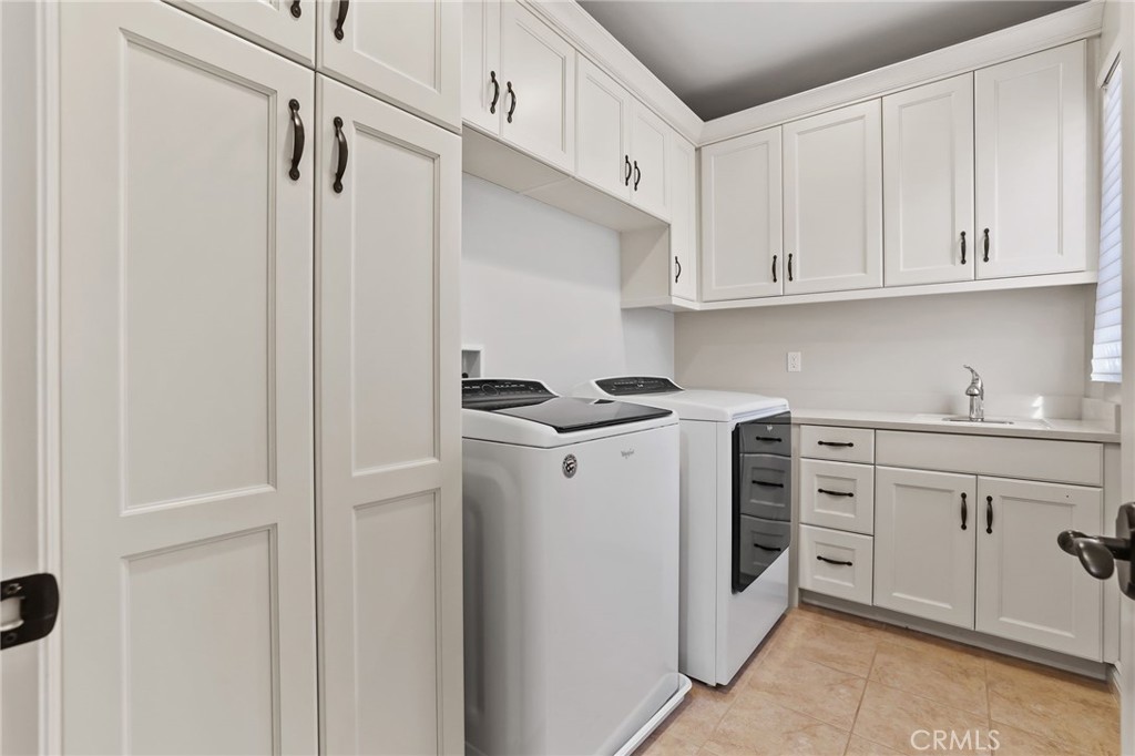 10 Shadybend Irvine, CA 92602 - Photo 50 of 70 a kitchen with cabinets and appliances