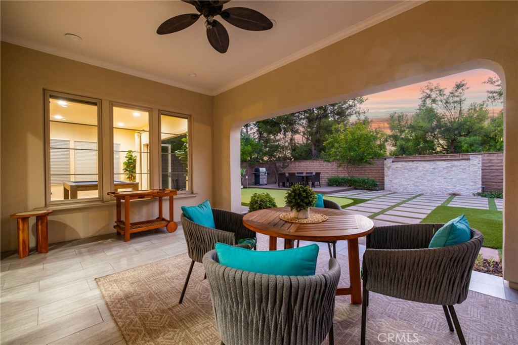 10 Shadybend Irvine, CA 92602 - Photo 60 of 70 a outdoor dining space with furniture and a garden