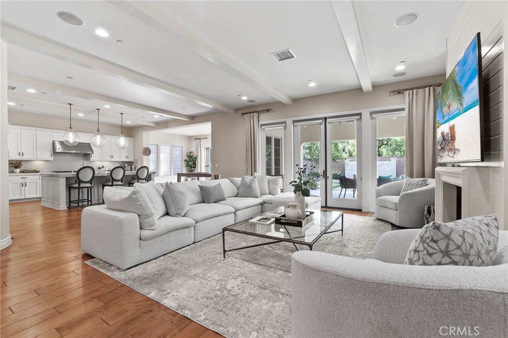 10 Shadybend Irvine, CA 92602 - Photo 7 of 70 a living room with furniture wooden floor and a large window