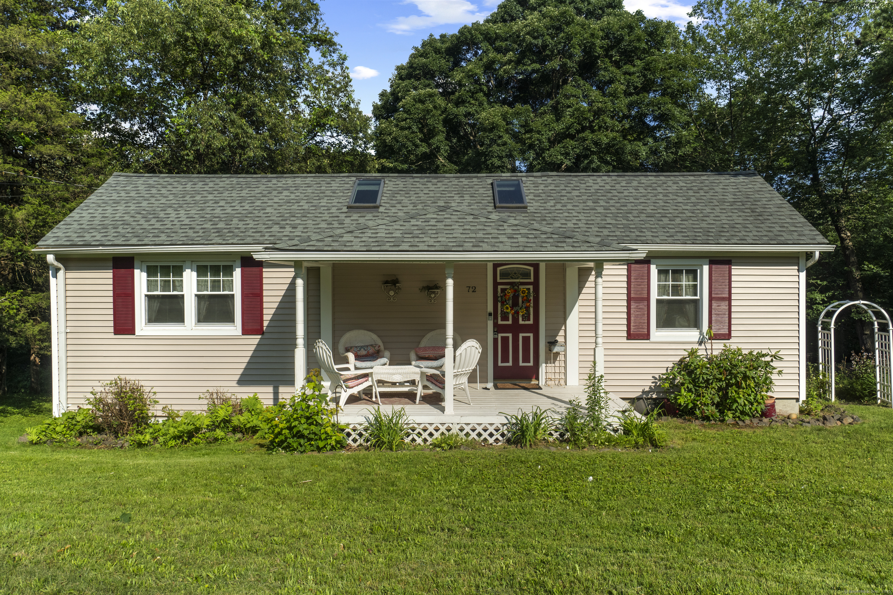 72 Upper State Street North Haven, CT 06473 - Photo 1 of 1 a front view of house with yard and outdoor seating
