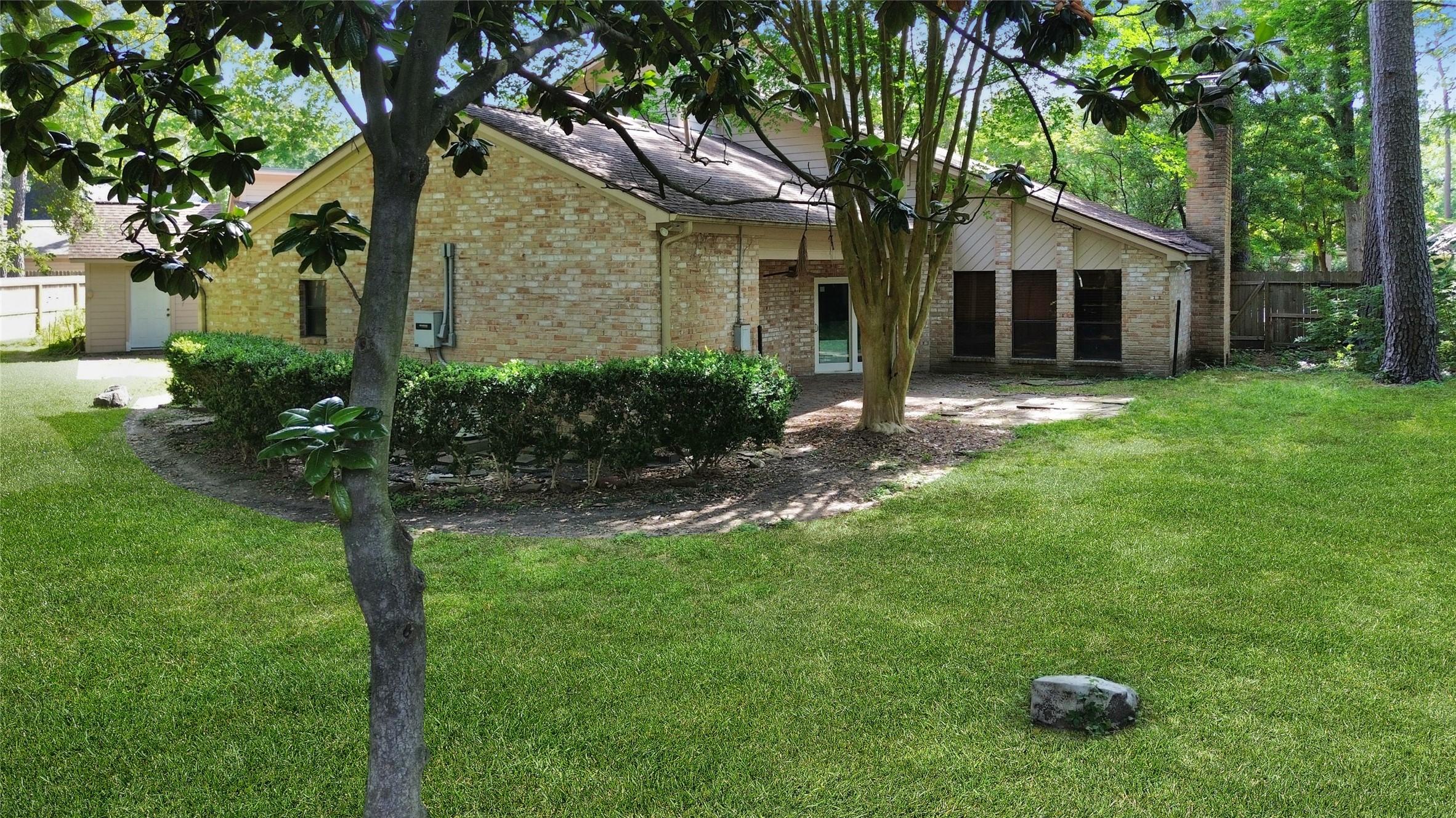 6514 Misty Springs Lane Spring, TX 77379 - Photo 17 of 49 a view of a house with backyard and garden