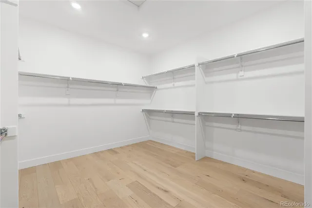 a view of an empty walk in closet