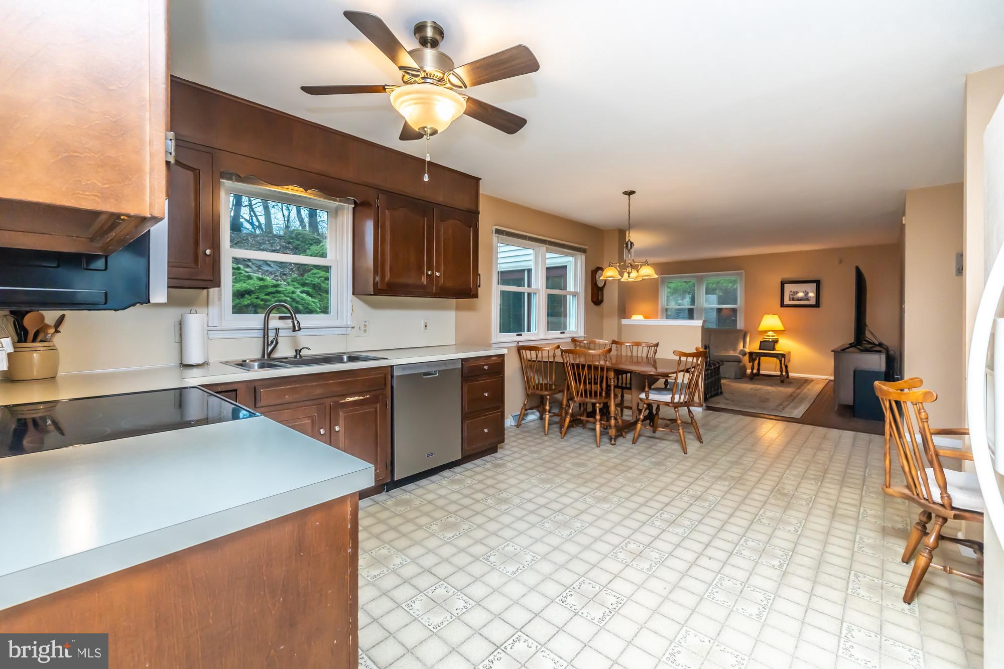 30 Estates Drive Reading, PA 19606 - Photo 16 of 45 a kitchen with a sink dining table and chairs