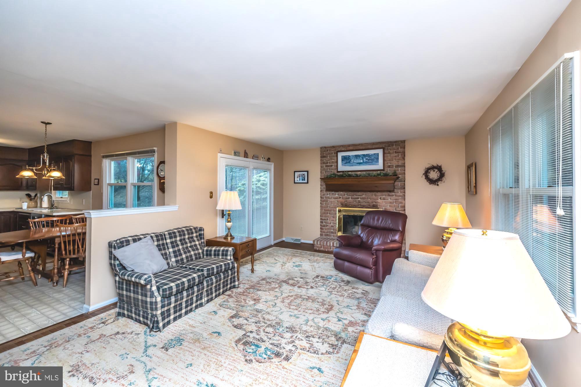 30 Estates Drive Reading, PA 19606 - Photo 21 of 45 a living room with furniture flat screen tv and a fireplace