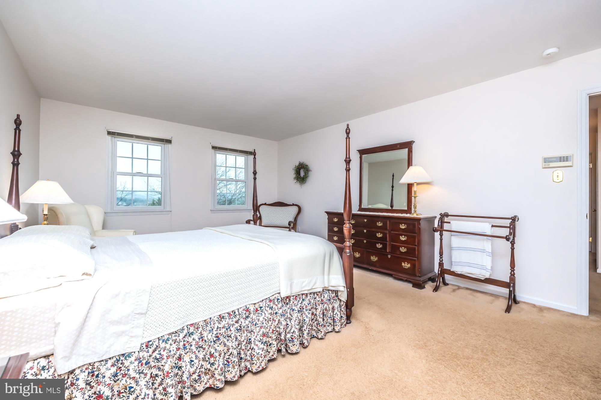 30 Estates Drive Reading, PA 19606 - Photo 26 of 45 a bedroom with a large bed and a dresser