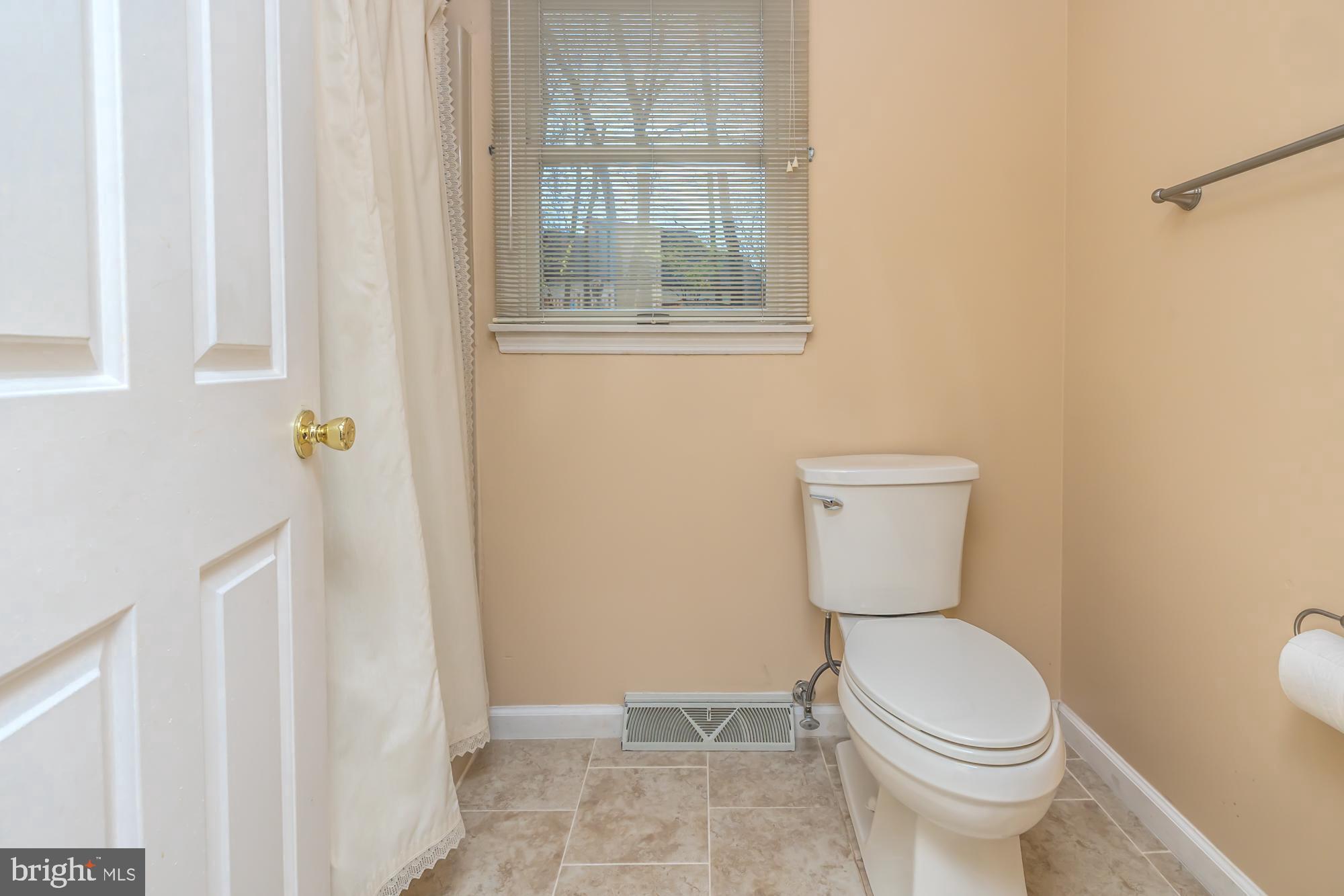 30 Estates Drive Reading, PA 19606 - Photo 29 of 45 a white toilet sitting next to a bathroom sink