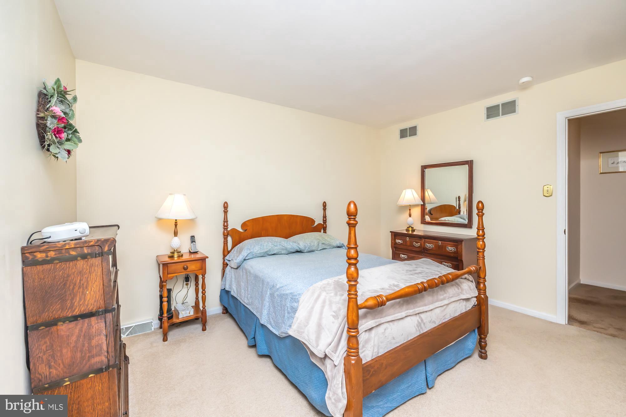 30 Estates Drive Reading, PA 19606 - Photo 32 of 45 a bedroom with a bed and dresser