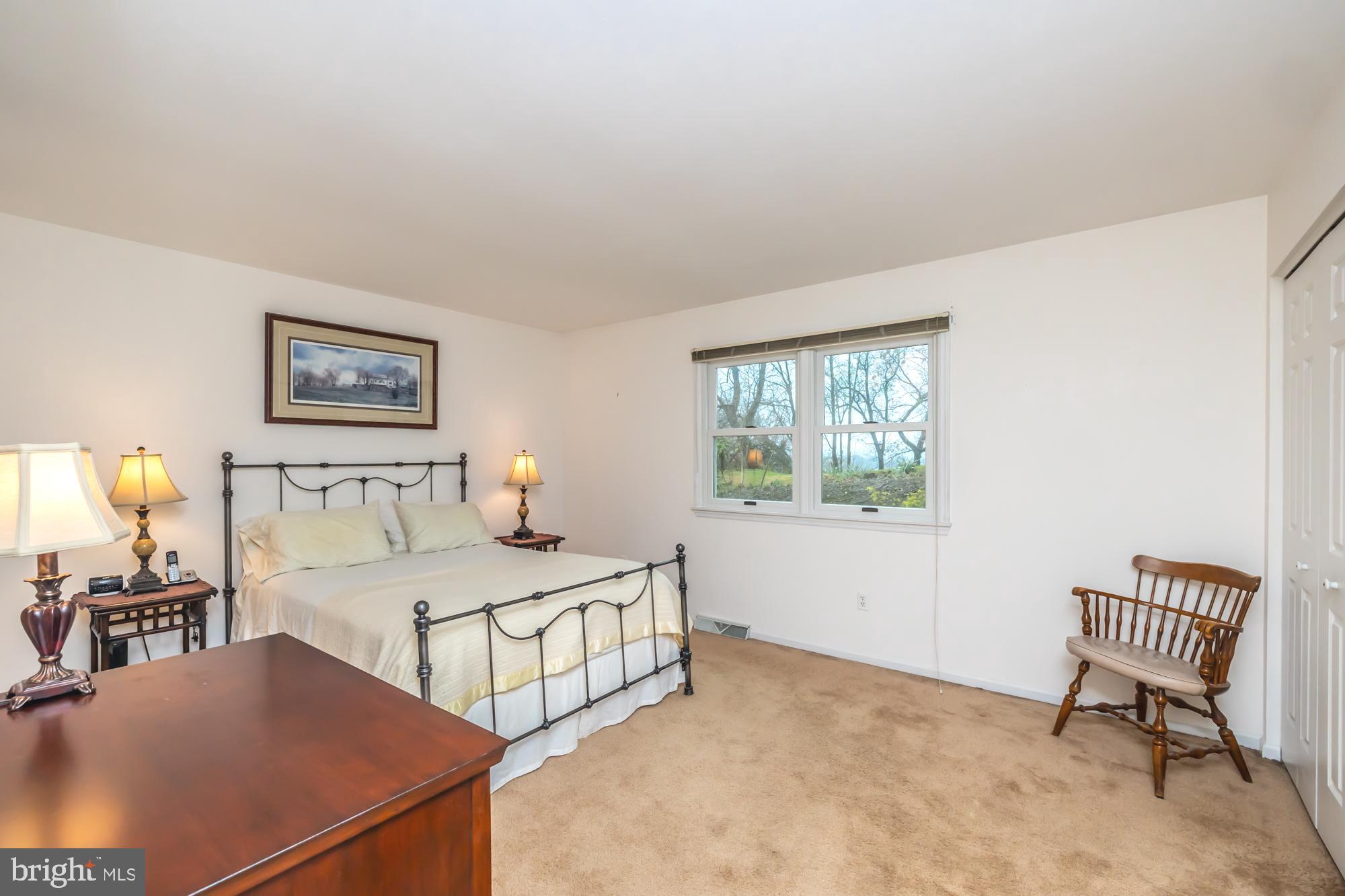 30 Estates Drive Reading, PA 19606 - Photo 37 of 45 a bedroom with a bed a table and chair