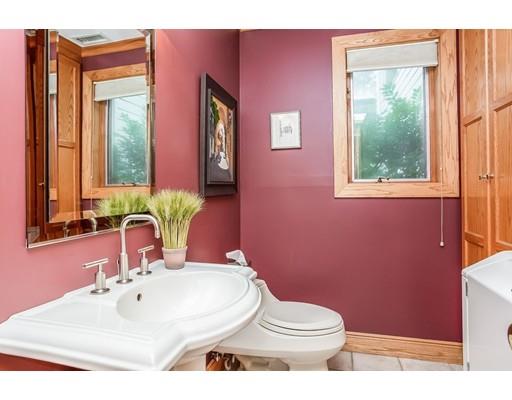 8 Springhouse Road Hampden, MA 01036 - Photo 12 of 30 a bathroom with a sink a toilet and mirror