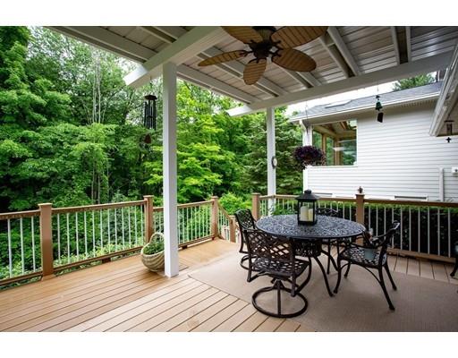 8 Springhouse Road Hampden, MA 01036 - Photo 22 of 30 a view of a patio with a table and chairs