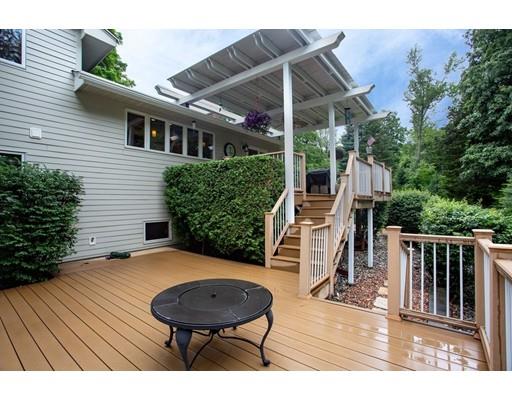 8 Springhouse Road Hampden, MA 01036 - Photo 23 of 30 a view of a chair and tables in the patio