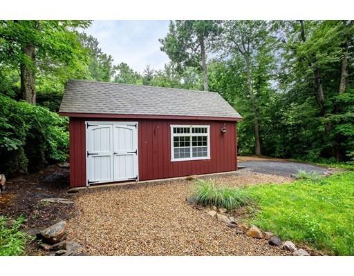 8 Springhouse Road Hampden, MA 01036 - Photo 29 of 30 a front view of a house with a garden