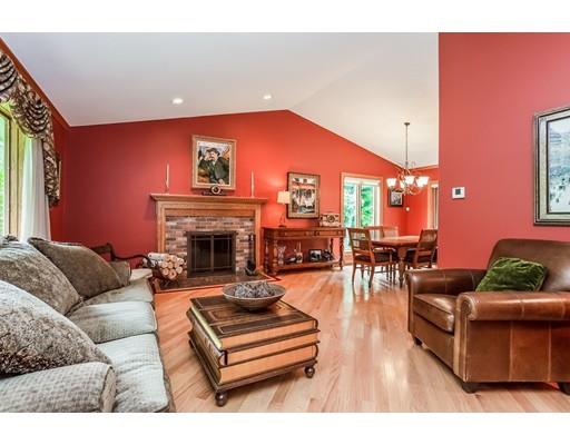 8 Springhouse Road Hampden, MA 01036 - Photo 4 of 30 a living room with furniture and a fireplace