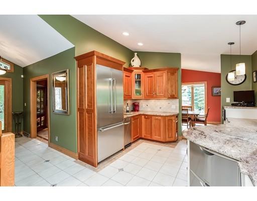 8 Springhouse Road Hampden, MA 01036 - Photo 8 of 30 a kitchen with stainless steel appliances granite countertop a refrigerator and a sink