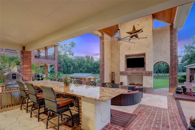 a view of a house with sitting area and furniture
