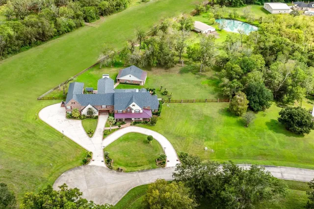 a view of a table and chairs in the patio