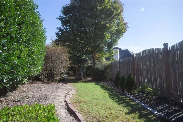 an aerial view of a house with a garden