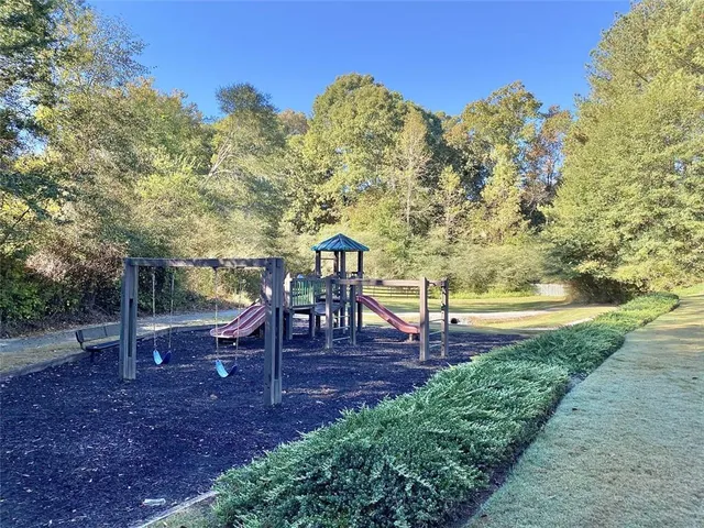 a view of a big yard next to a large building
