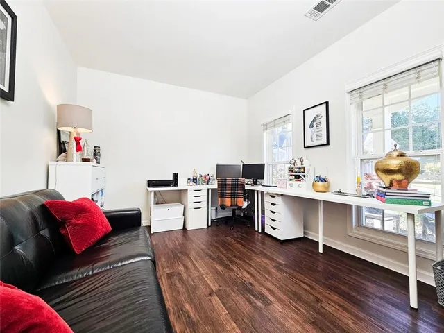 a kitchen with a refrigerator and a sink