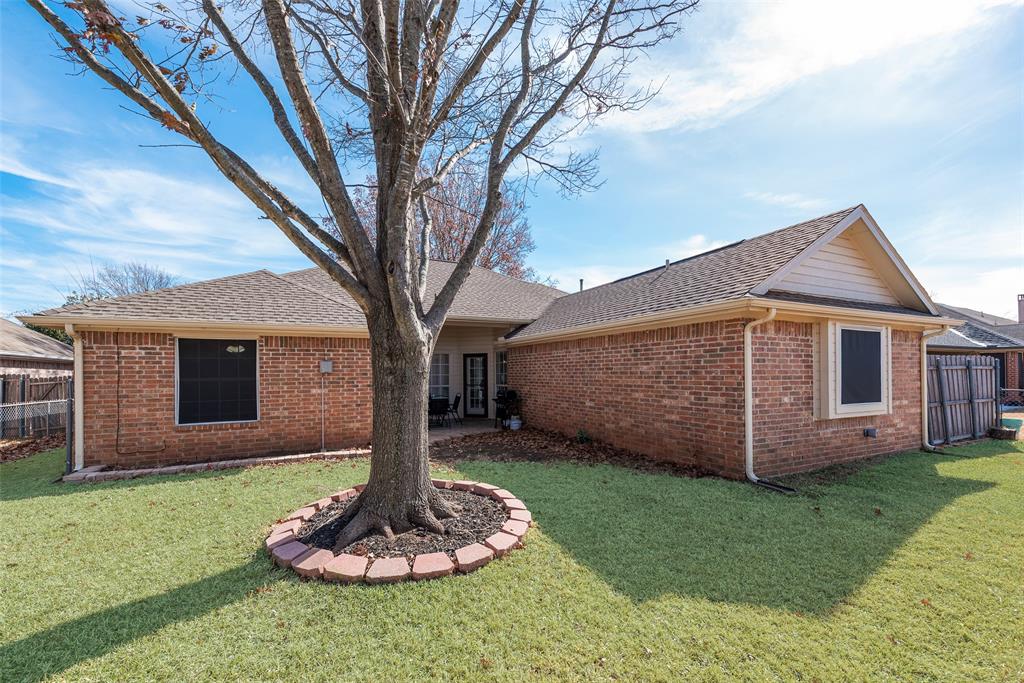 106 Villanova Circle Forney, TX 75126 - Photo 25 of 26 a front view of a house with a garden and yard