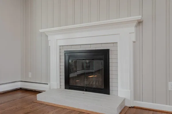 a kitchen with granite countertop a sink and a window