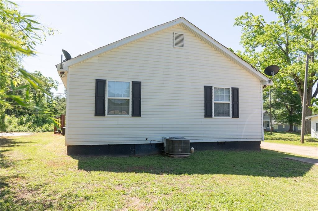 53 Washington Drive Forsyth, GA 31029 - Photo 18 of 19 a view of house with backyard