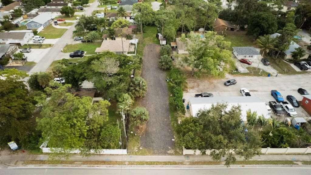 3630 South Haverhill Road Greenacres, FL 33463 - Photo 2 of 9 an aerial view of house with yard
