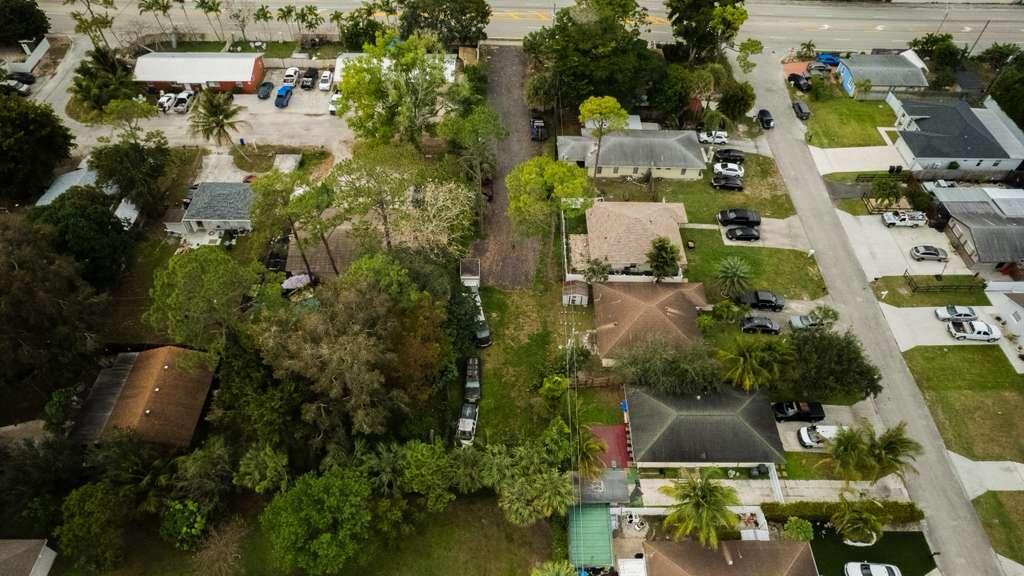 3630 South Haverhill Road Greenacres, FL 33463 - Photo 4 of 9 an aerial view of residential houses with outdoor space