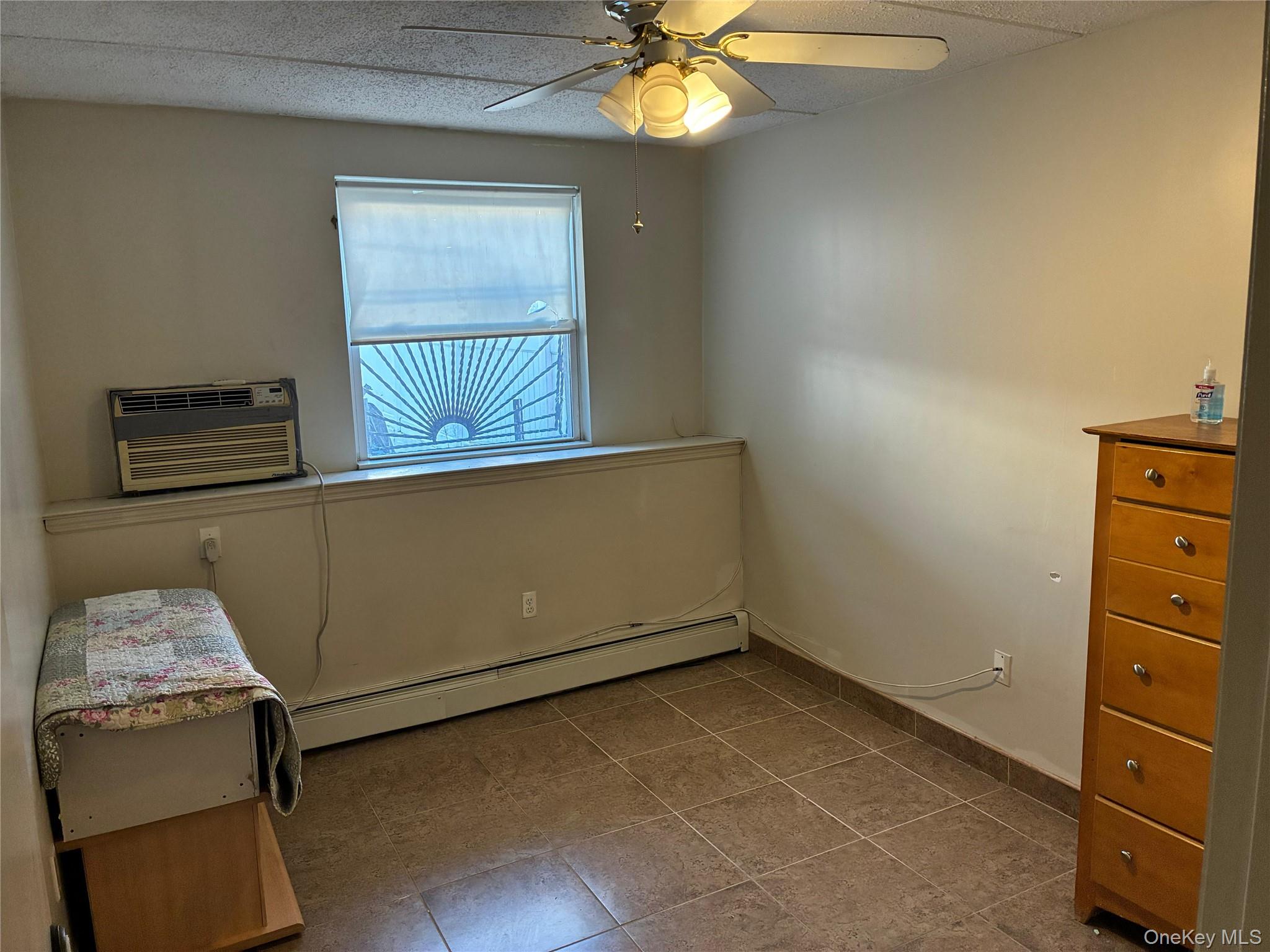 21 Renaissance Court Brooklyn, NY 11206 - Photo 11 of 21 an empty room with windows