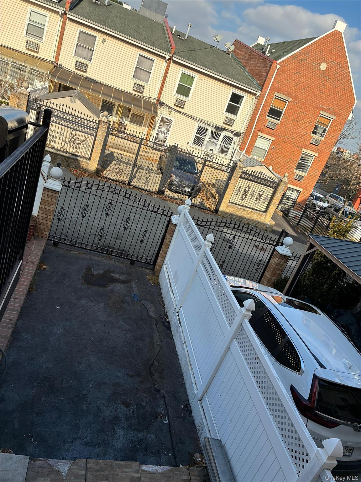 21 Renaissance Court Brooklyn, NY 11206 - Photo 18 of 21 a view of a chairs and table in the balcony