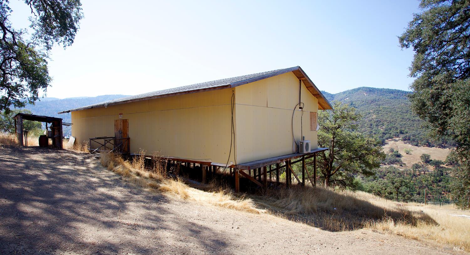 35100 Mendocino Pass Road Covelo, CA 95428 - Photo 13 of 14 a view of a backyard of a house