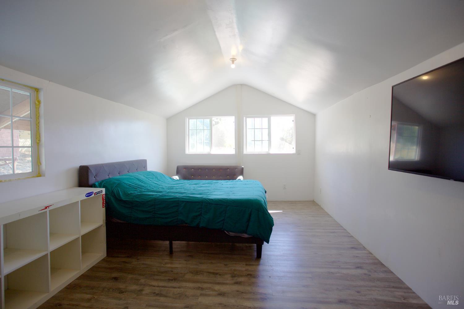 35100 Mendocino Pass Road Covelo, CA 95428 - Photo 7 of 14 a room with a bed and a window