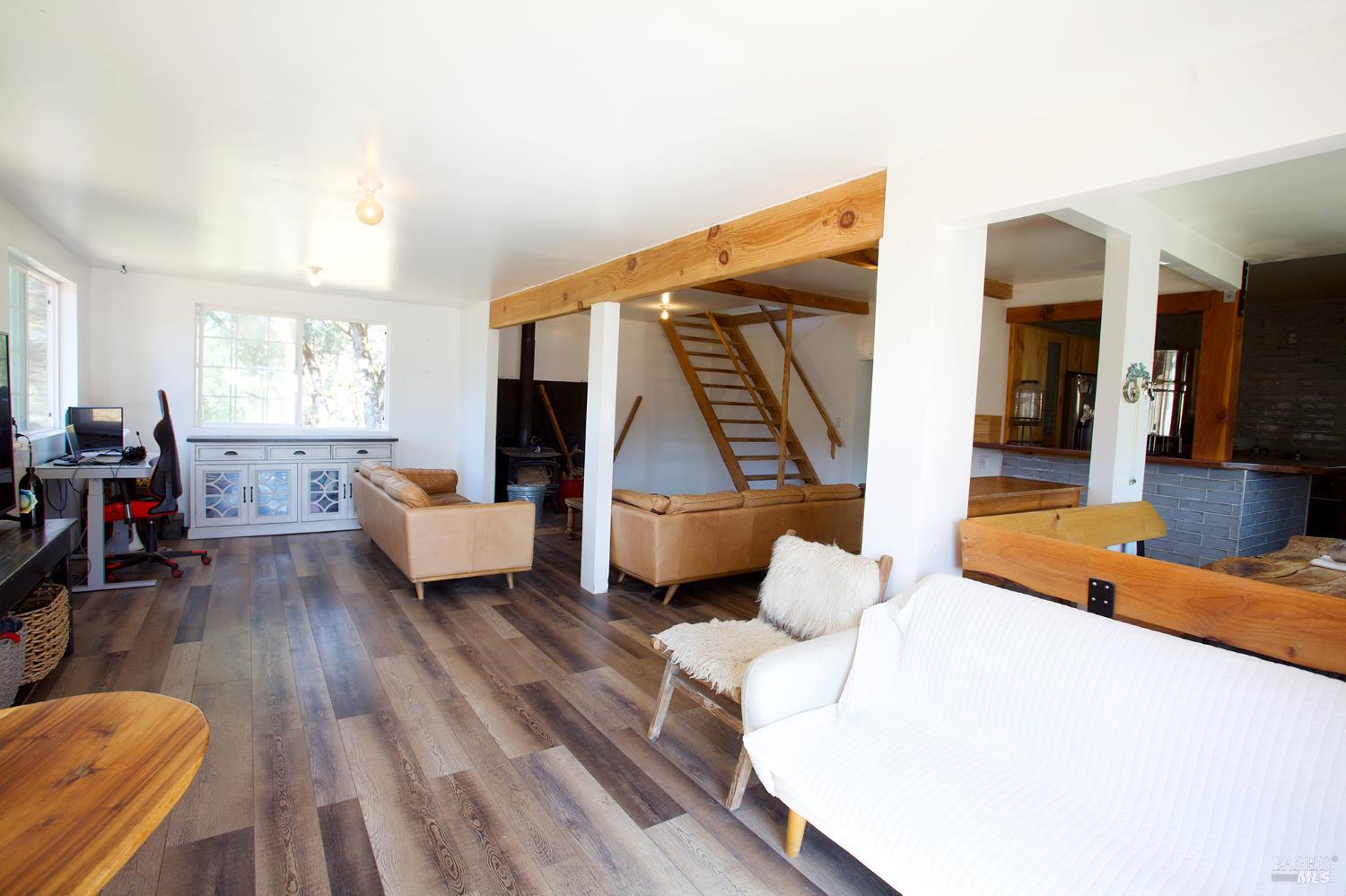 35100 Mendocino Pass Road Covelo, CA 95428 - Photo 10 of 14 a living room with furniture and wooden floor