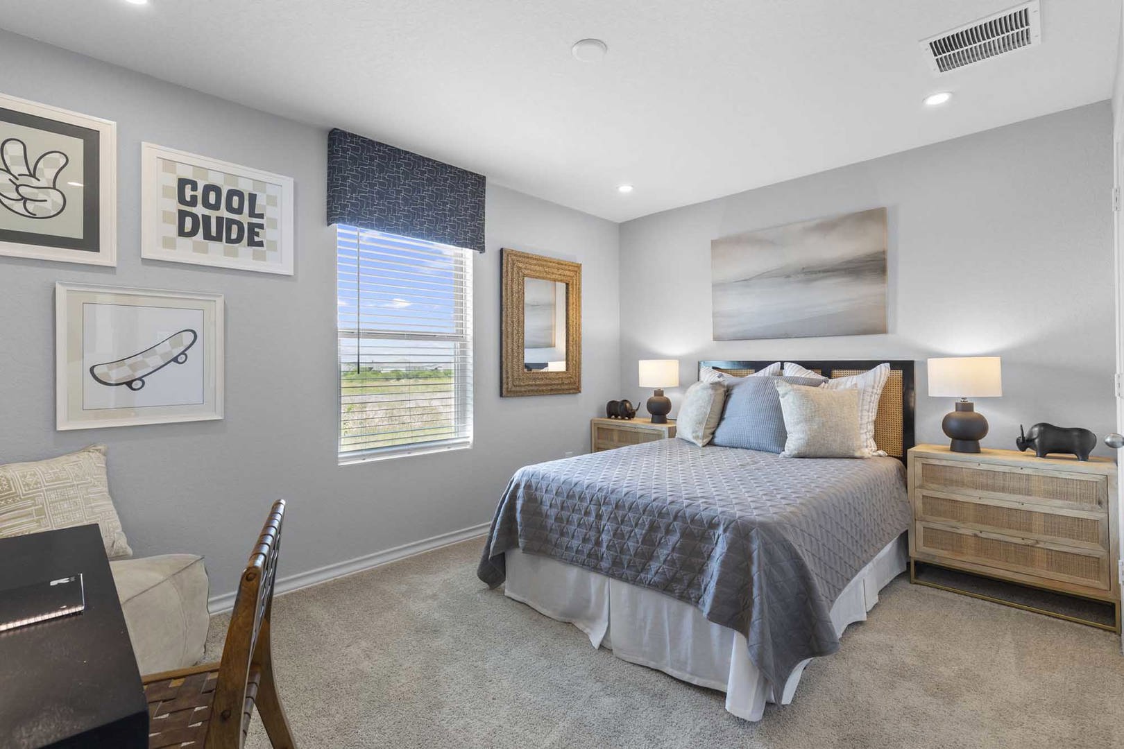 105 Hatari Trail Jarrell, TX 76537 - Photo 24 of 27 Recessed lighting illuminates this comfortable bedroom featuring soft carpet and a large window.
