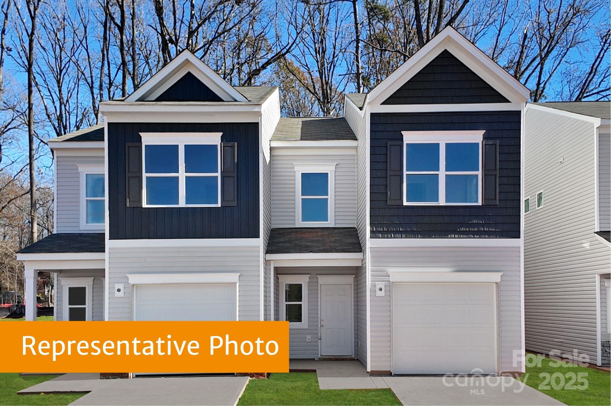 5612 Ringneck Road Charlotte, NC 28216 - Photo 2 of 24 a view of parking space with a car parked