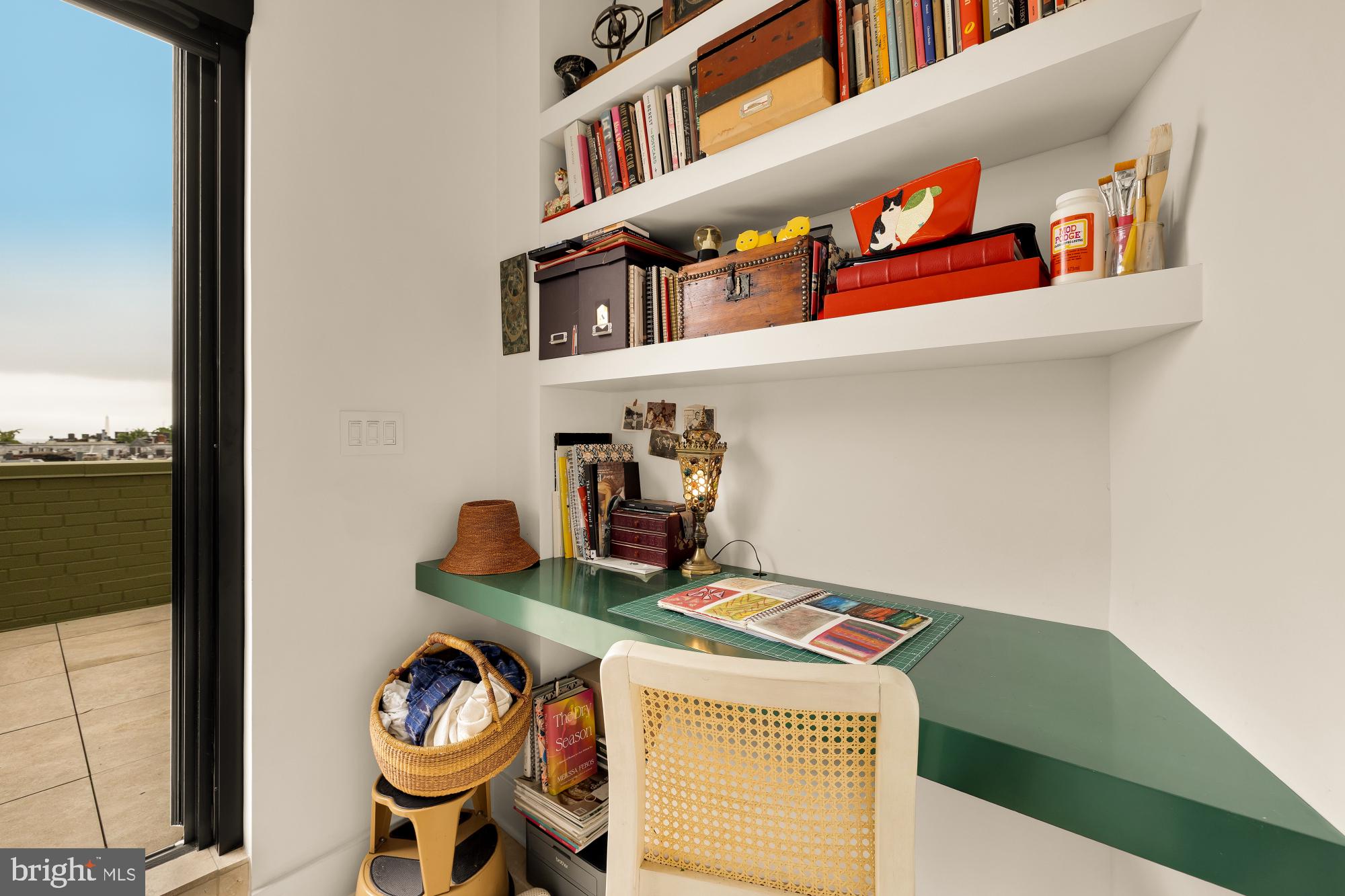 2424 18th Street Northwest, Unit R1 Washington, DC 20009 - Photo 14 of 24 a utility room with lots of clutter and cabinets