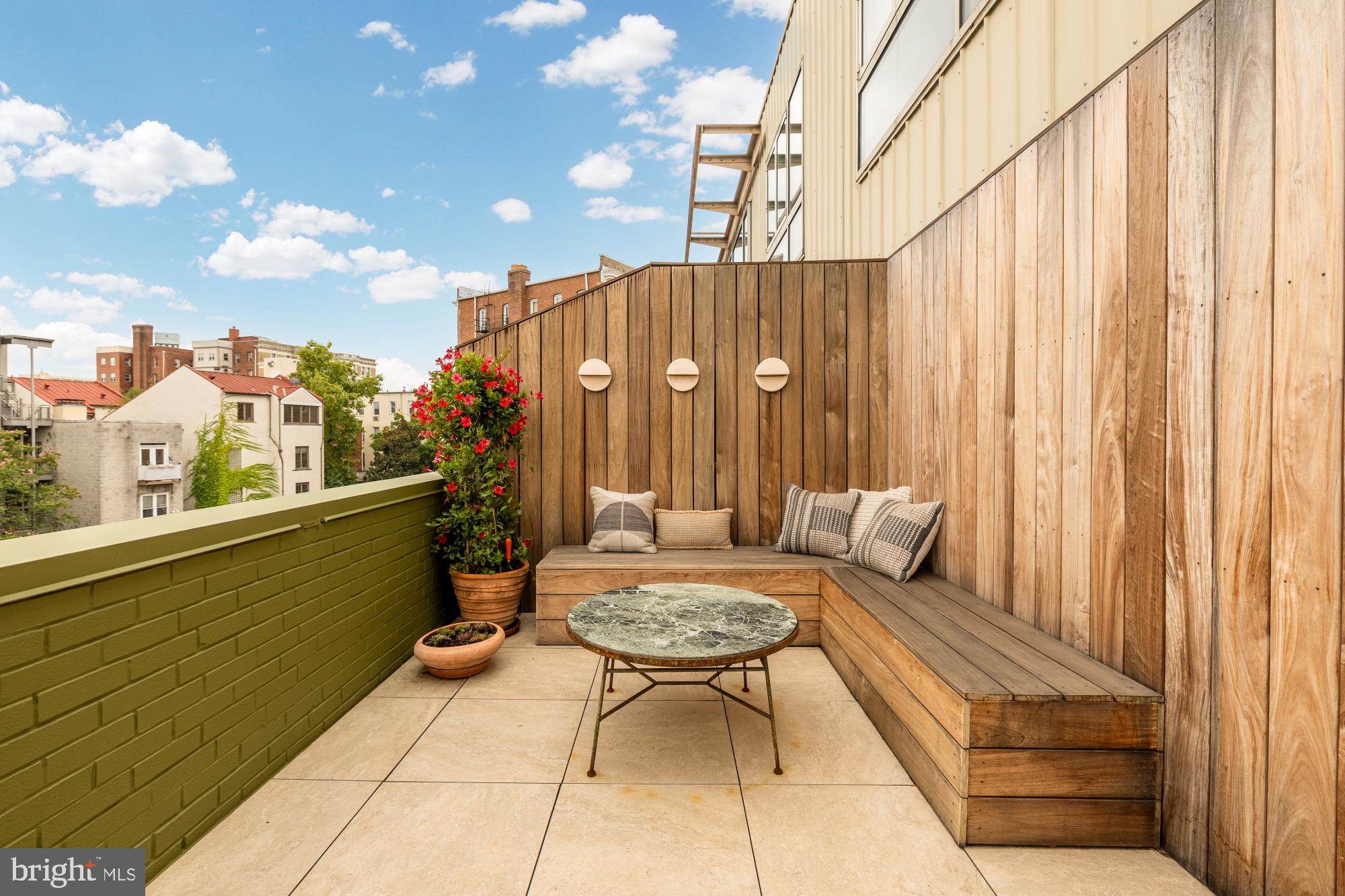 2424 18th Street Northwest, Unit R1 Washington, DC 20009 - Photo 15 of 24 a balcony with chairs and outdoor views